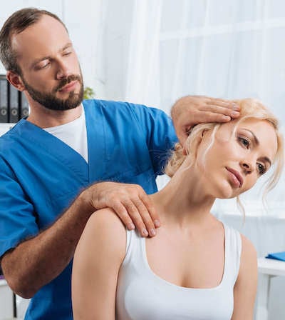 Chiropractor reviewing liability insurance coverage