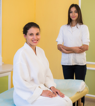 Clinician treating a student at a campus health center
