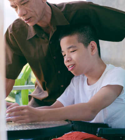 Support worker assisting a client at a developmental disability center