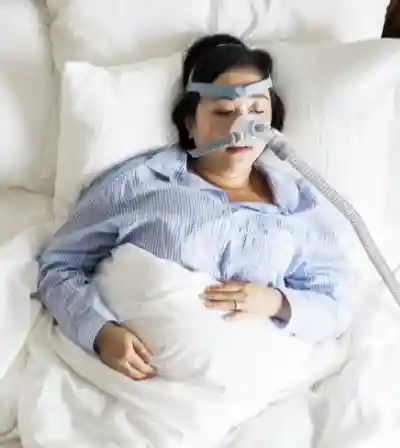Patient undergoing an overnight sleep study at a sleep clinic