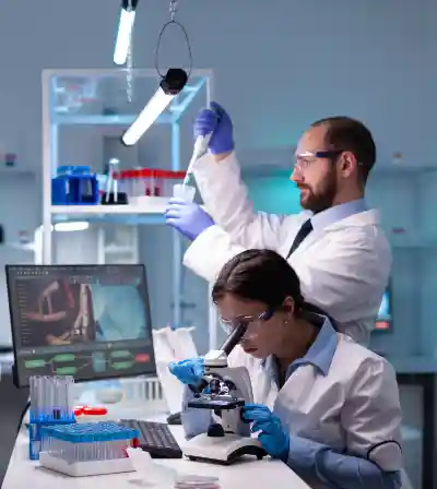 Pathologist examining tissue slides in a laboratory