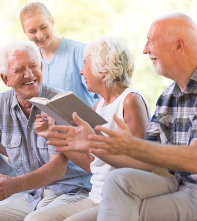 Staff at a residential care center assisting residents with daily activities