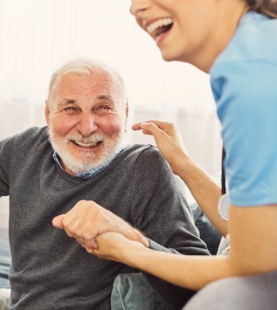 Care worker assisting an elderly client