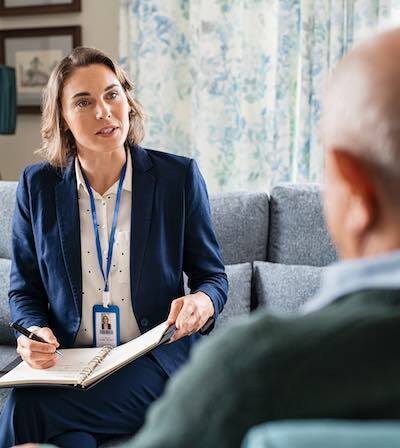 Social worker meeting a client at a community service organization